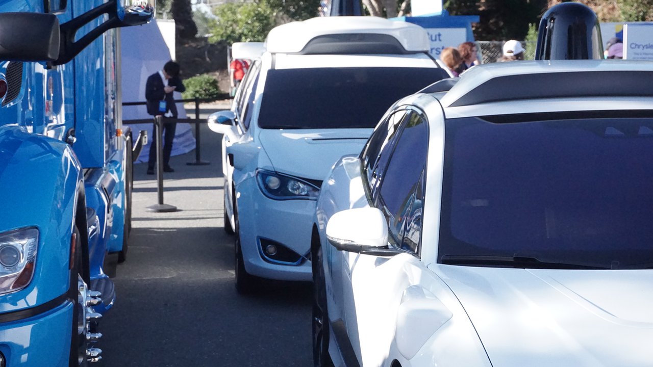 Waymo minivans and trucks.